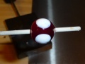 Step 2 Round black bead with melted white dots.jpg